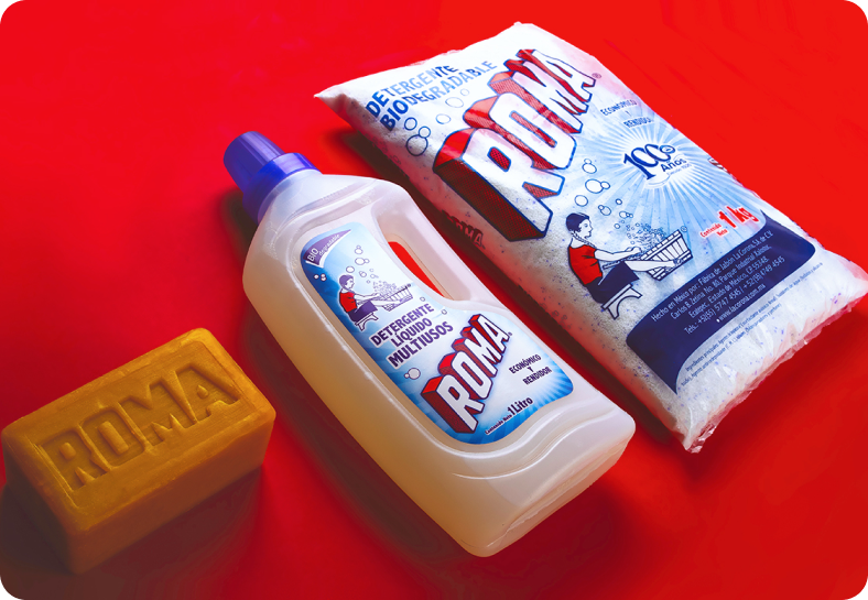 Roma household products — detergents on red background, commercial photography.