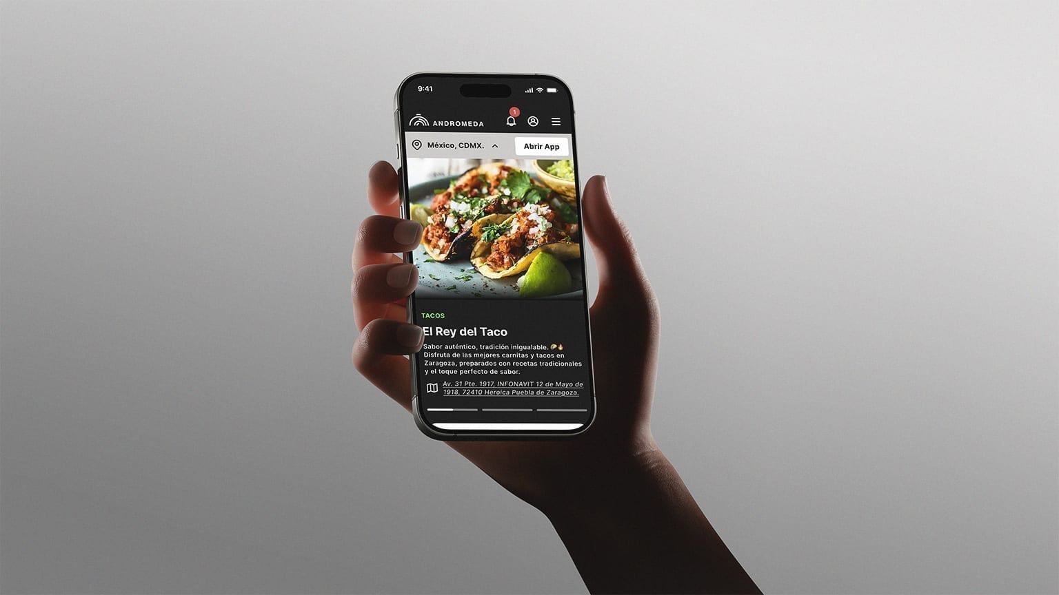 Smartphone mockup of Andrómeda venue discovery interface.