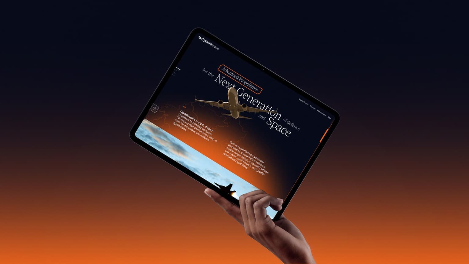 Tablet held against a sunset showing CycloKinetics next-generation propellants concept.