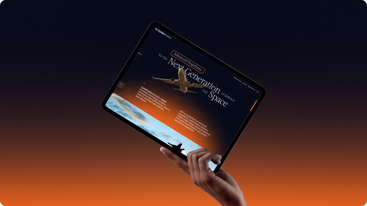 Tablet held against a sunset showing CycloKinetics next-generation propellants concept.