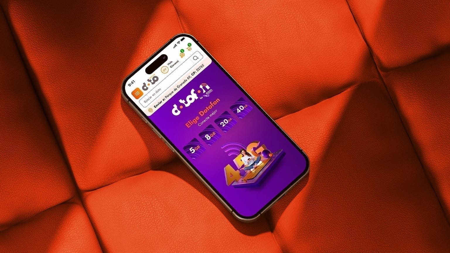 Smartphone on orange quilted leather showing Doto's mobile homepage with the purple DotoFon plan chooser (5GB–40GB).