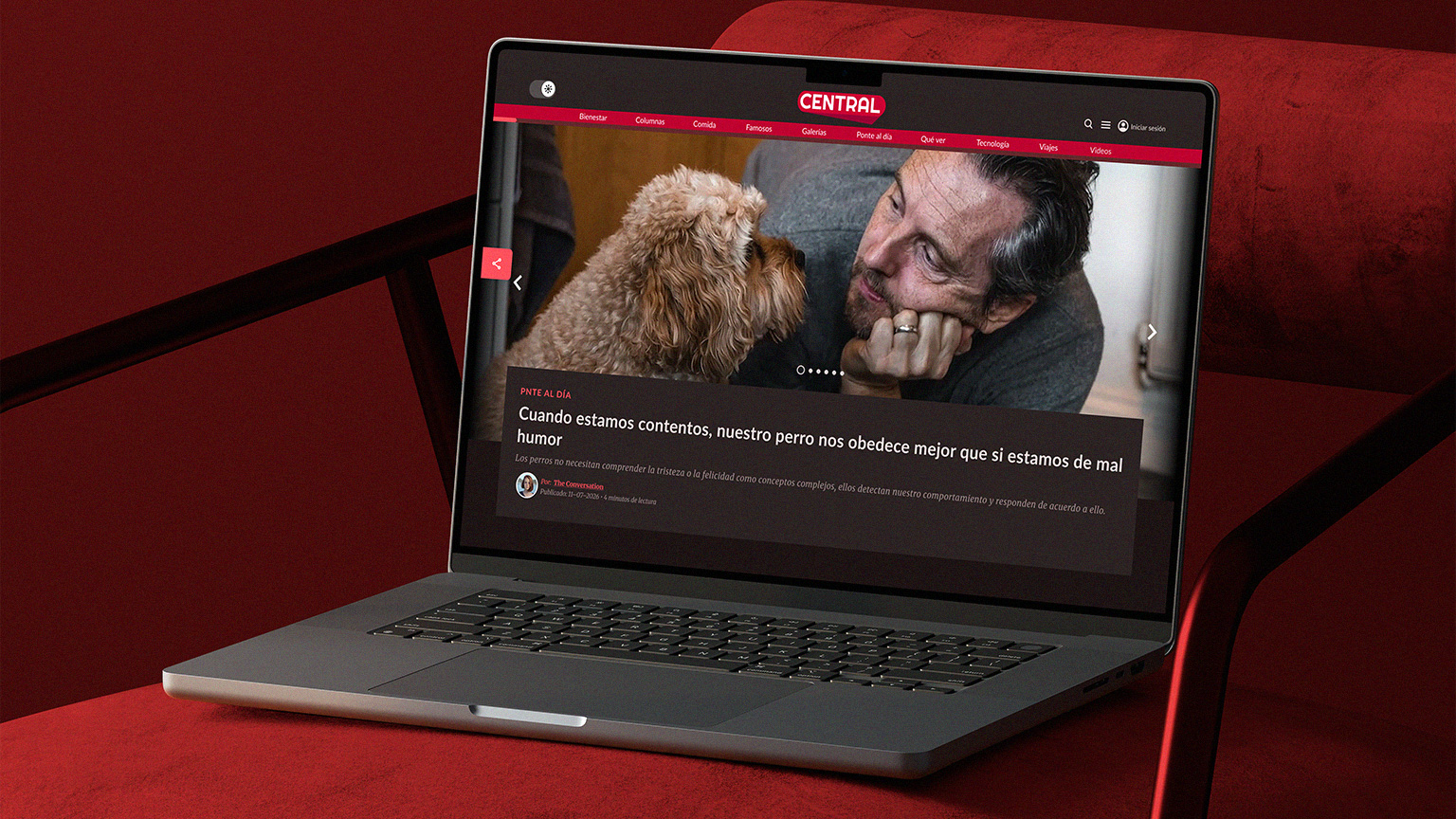 Laptop showing Revista Central homepage hero carousel.