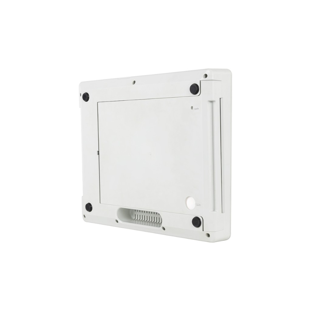 Angled rear/underside of the Cardiovit AT-102 G2: rubber feet, central access panel, connector area — no front display in frame.