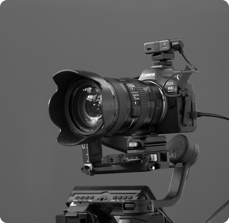 Canon EOS R6 Mark II camera mounted on a professional gimbal, grey background.